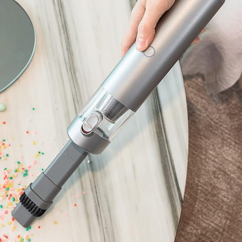 Carrisma Carisma™ Power Clean wireless car vacuum cleaner with handheld design and nozzle attachment for effective vehicle cleaning.