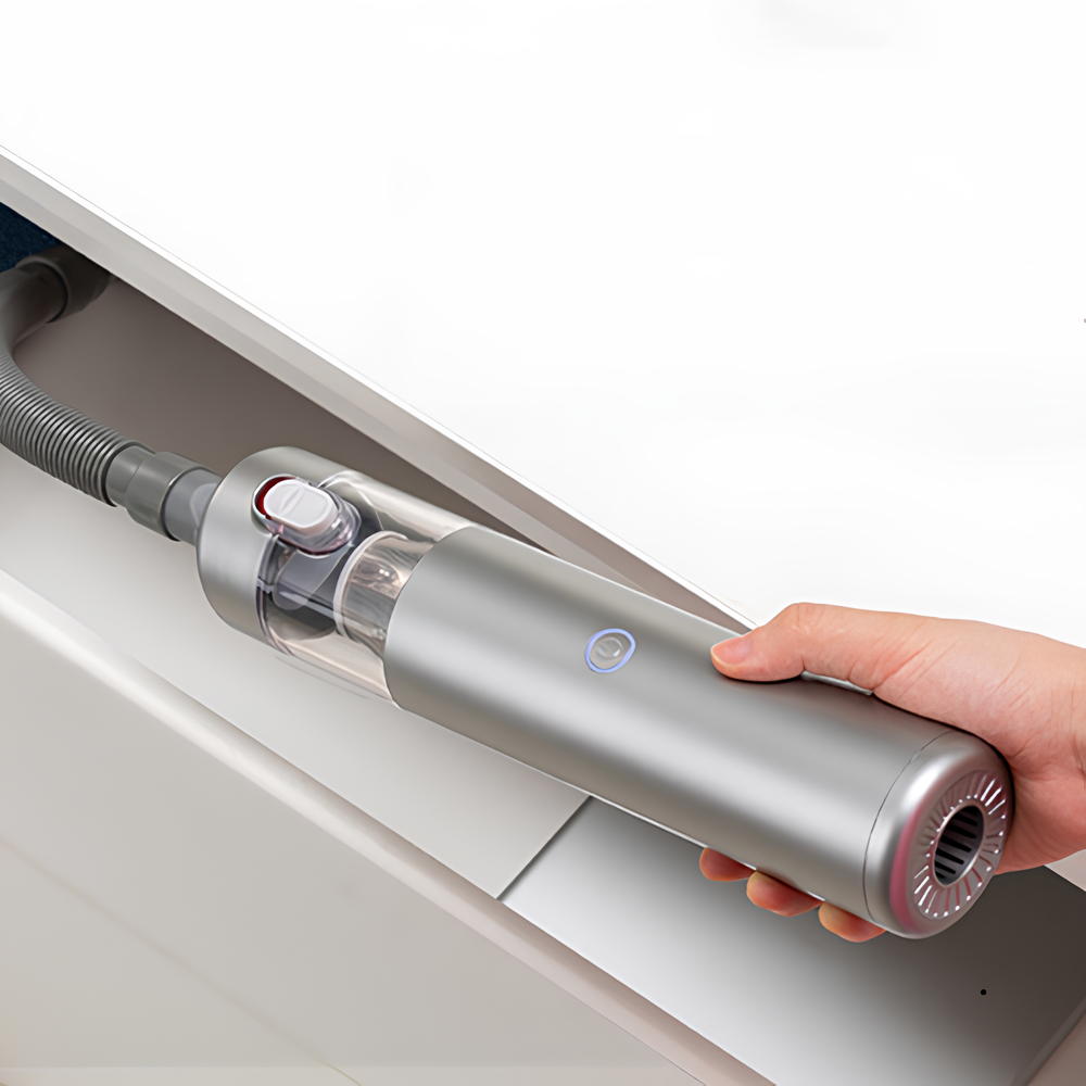 Carisma™ Power Clean wireless car vacuum cleaner with a sleek handheld design and detachable dust container.