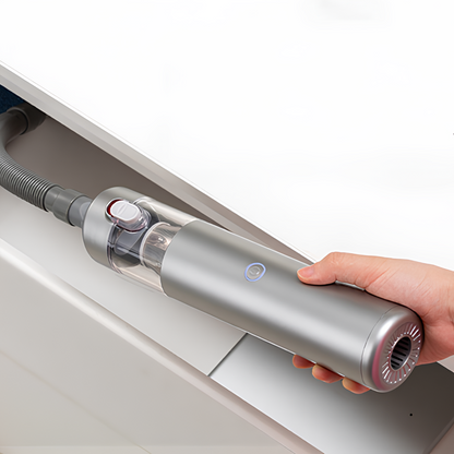 Carisma™ Power Clean wireless car vacuum cleaner with a sleek handheld design and detachable dust container.